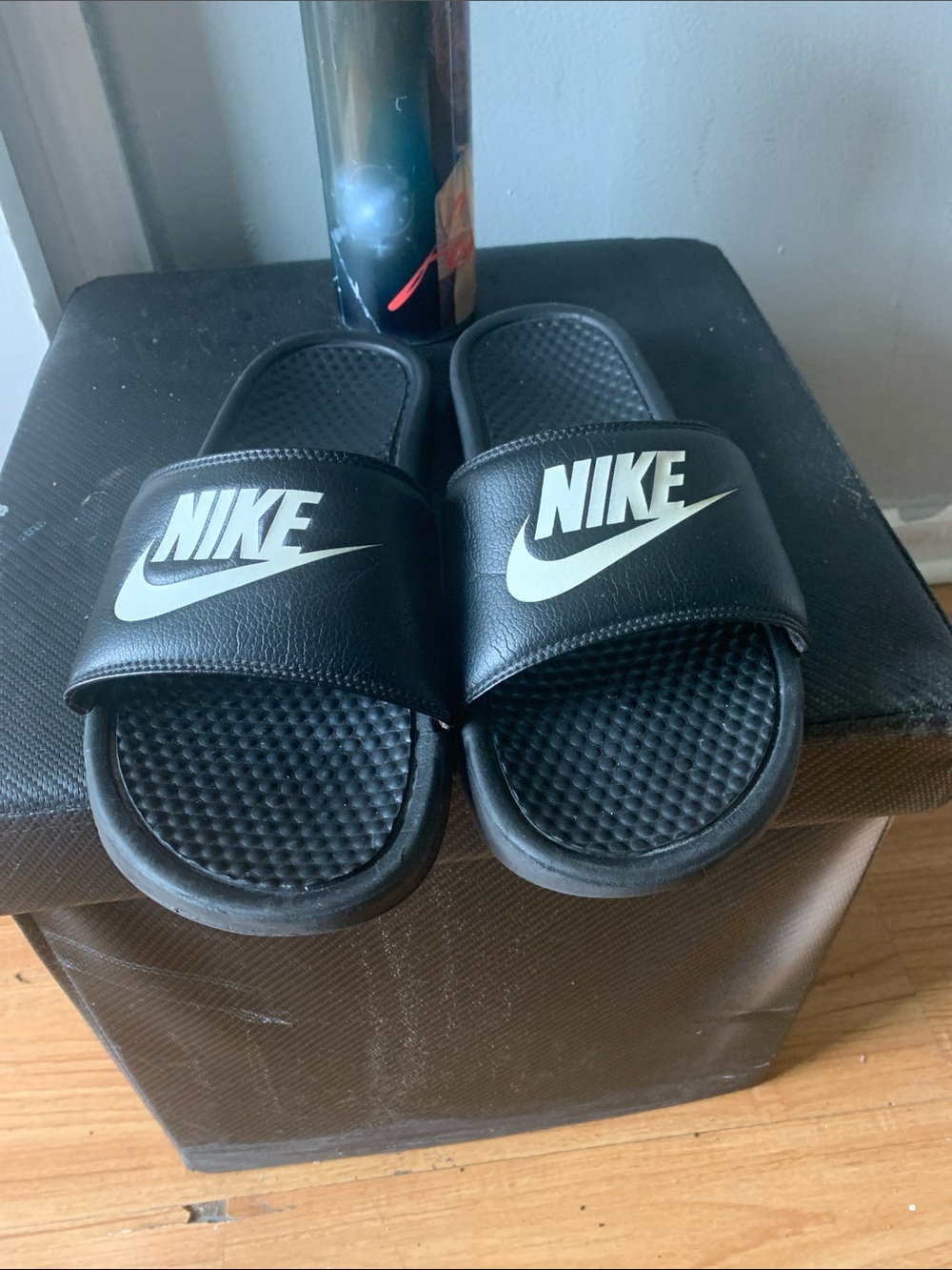 Nike Youth Black Slides with White Swoosh Logo